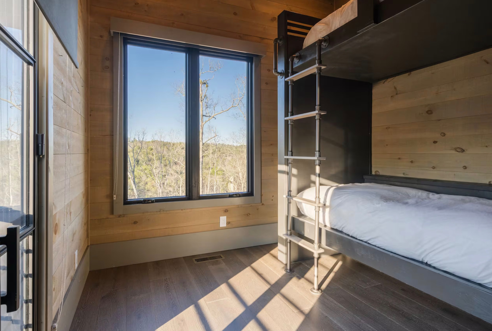 Twin XL bunk bed room with two long mattresses