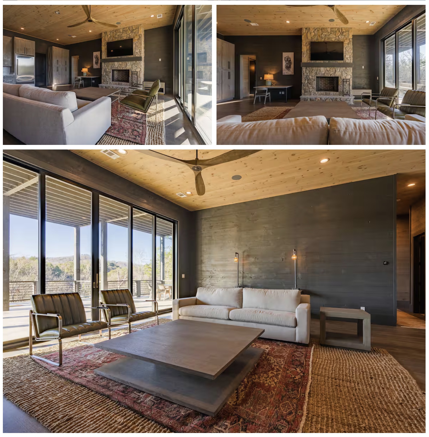 Living room with stone fireplace and large windows