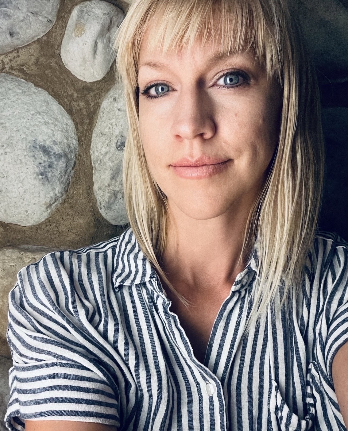 Portrait of Alea Morren, owner and artist behind Adanel Studio